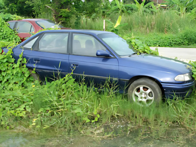 Abandoned junk car on a property